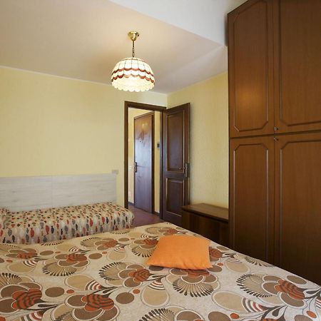 Residenz La Vela Apartman Baveno Szoba fotó