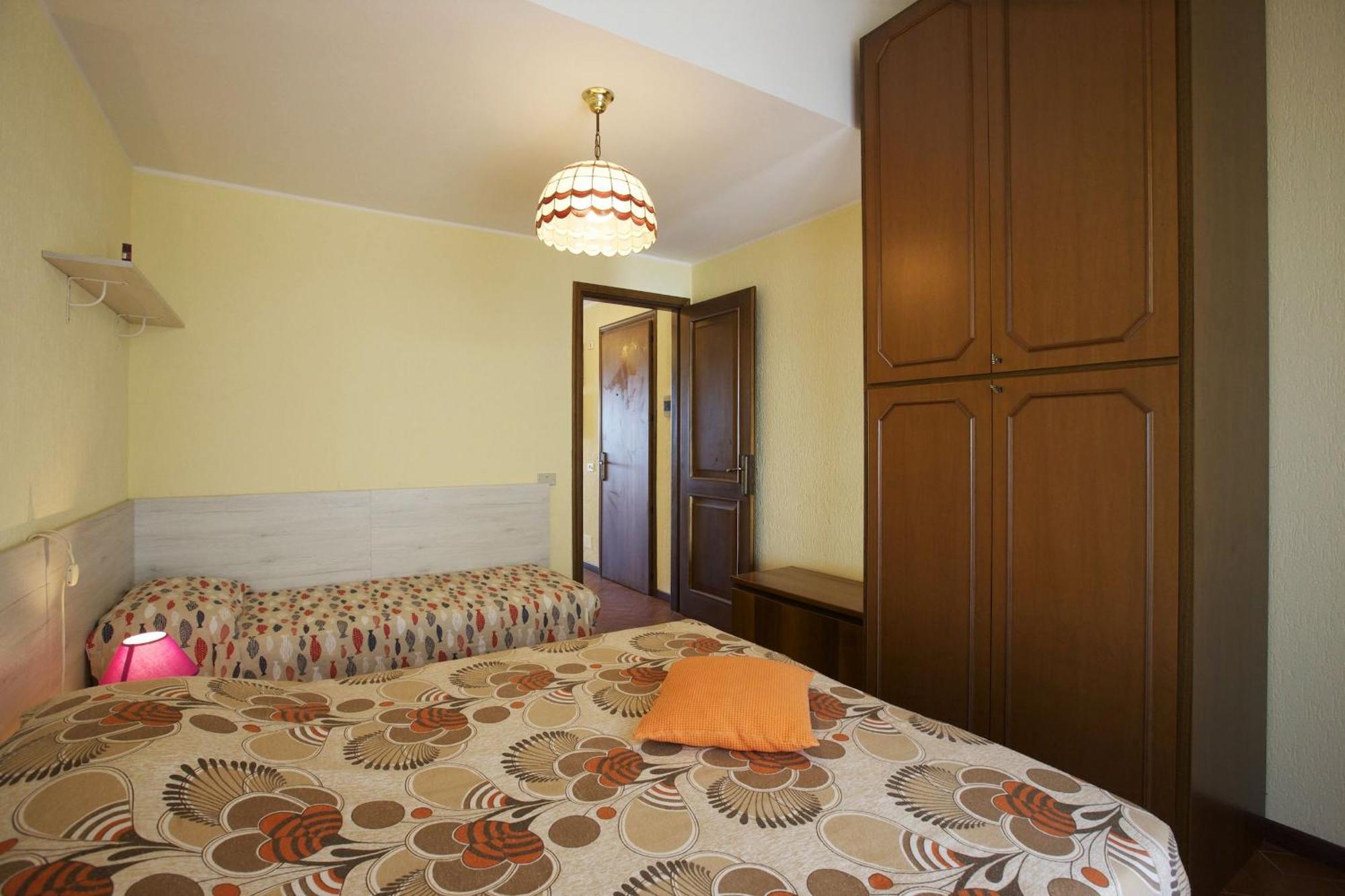 Residenz La Vela Apartman Baveno Szoba fotó